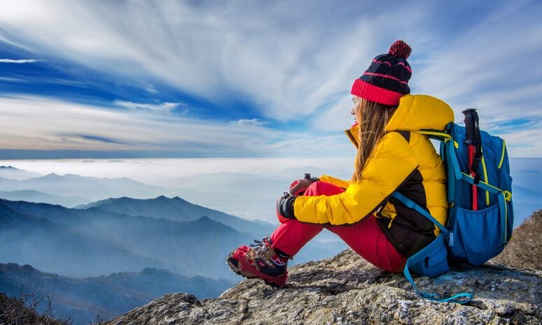 young-woman-sitting-hill-high-mountains-1-