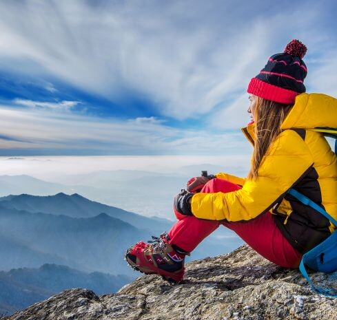 young-woman-sitting-hill-high-mountains-1-