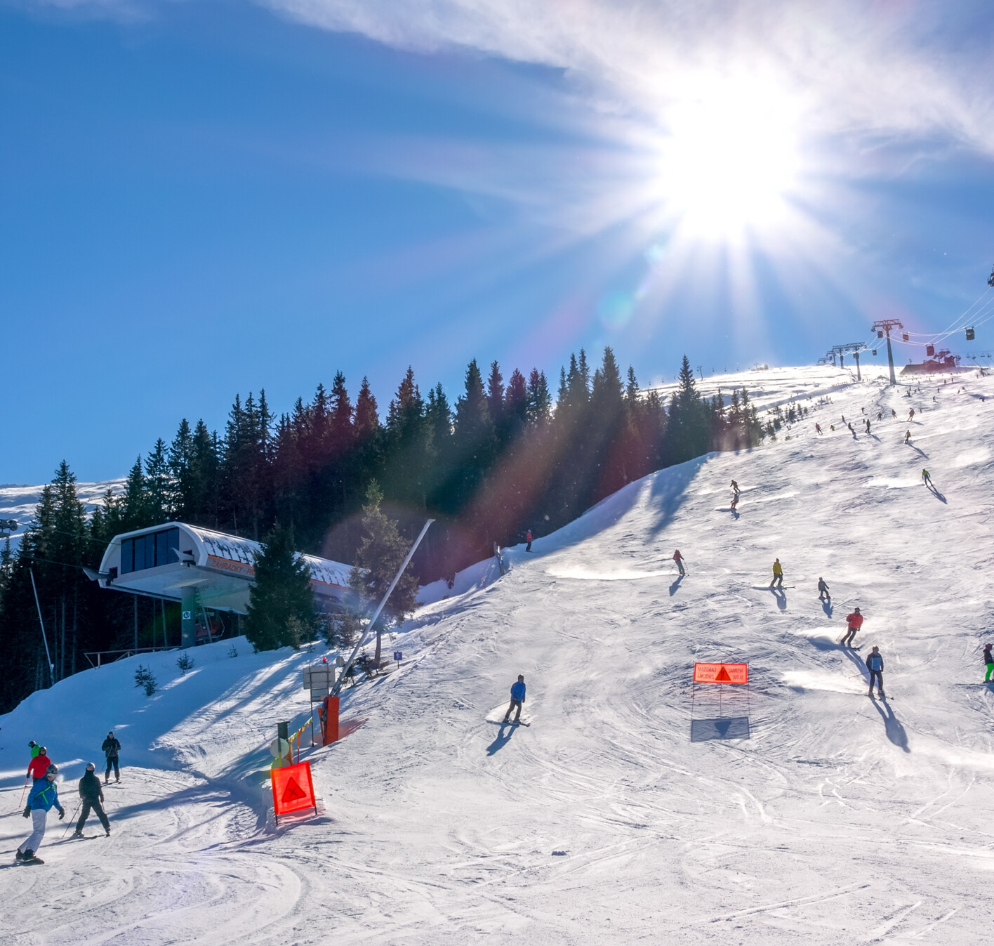 slovakia-winter-ski-resort-jasna-bright-sun-blue-sky-ski-slope-ski-lifts-many-skiers